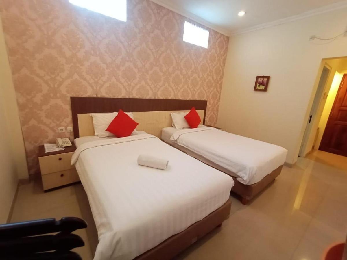 Oyo 90473 Gowin Hotel Кута Екстер'єр фото