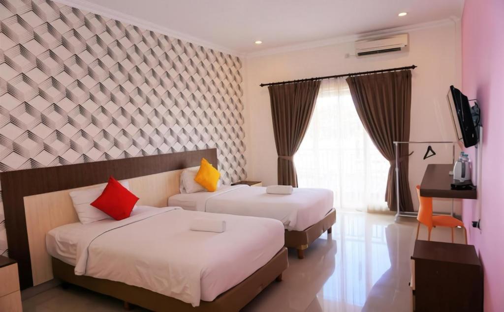 Oyo 90473 Gowin Hotel Кута Екстер'єр фото